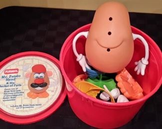 Playskool Mr. Potato Head with 26 pieces (all that's missing are the yellow glasses!).