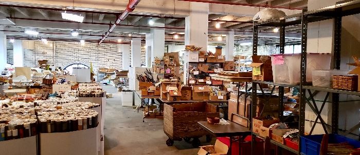 Posters and shelves of deadstock novelty and ephemera