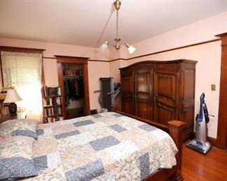 Victorian armoire, kingsize head and foot board bed, kenmore vacuum and large collection of books