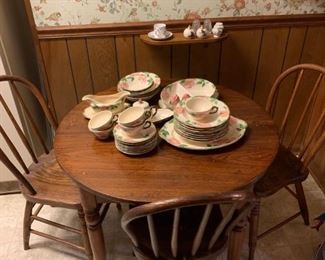 Quaint Round Table and Three Chairs