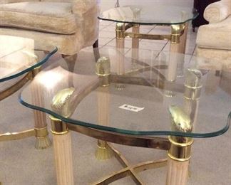 We have four of these Grecian looking glass top tables, all in great shape $30.00 each
