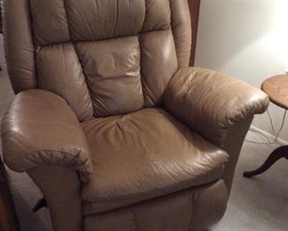 two big cumfy recliners, perfect for the man cave or teenagers rec room, one has some slight damage on the bottom of the seat $150.00 each