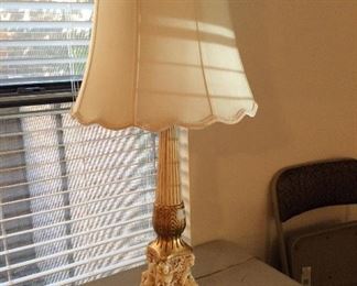 we have a pair of these wonderful lamps with cherubs dancing around the base $50.00 each