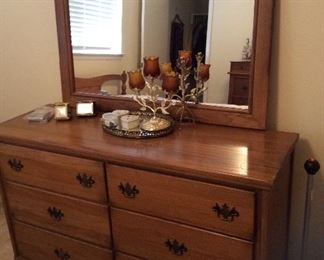 Dresser with mirror $150.00, full bed in previous picture $185.00 includes wood frame and mattress set