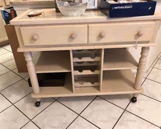 great looking buffet/cart with wine storage, shelf and drawers, has tile top