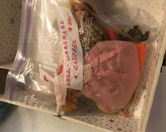 Barbie and wardrobe with a collection of her clothes
