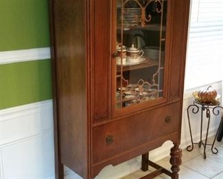 The cherry china cabinet