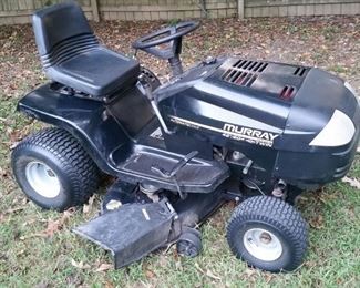 Murray 42" cut riding mower with twin cylinder 20 hp engine, automatic drive,, and new battery.
