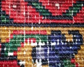 A closeup look at the back of the Persian rug