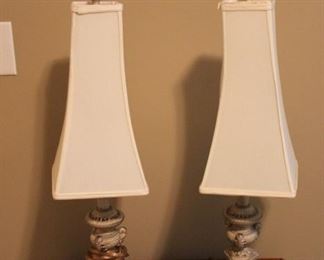 Duo of ivory lamps with unique shades