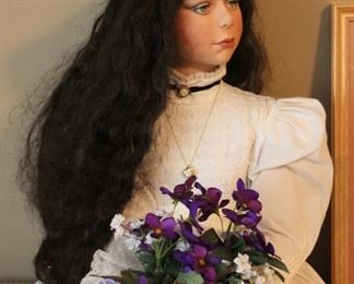 Charming 4 foot tall porcelain victorian style doll.