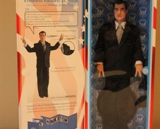 Richard Nixon Collectible Doll - his hands are in the Victory gesture.