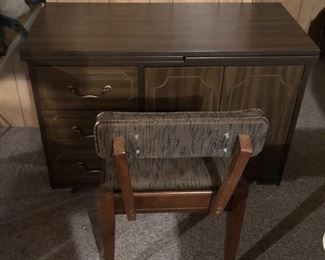 Sewing machine cabinet and chair. Chair has storage for your supplies