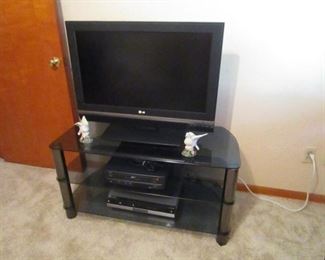 FLAT SCREEN TV AND STAND
