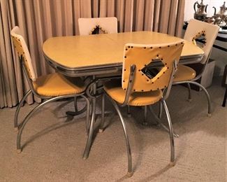 VINTAGE RETRO YELLOW FORMICA TOP CHROME TABLE WITH 4 CHAIRS.