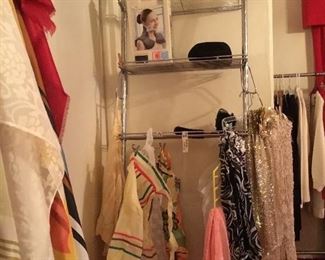 Vintage aprons, bathroom over commode shelf with glass shelves