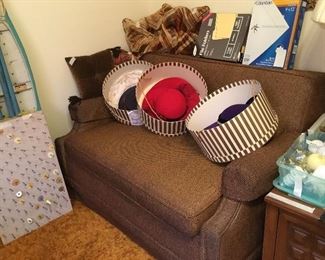 Lots of great hats, hat boxes, lots of brand names & colors And hide a bed love seat