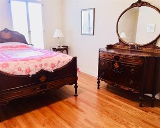 AN ANTIQUE LOUIS XVI STYLE WALNUT MARQUETRY 3-PIECE CARVED BEDROOM SUITE/SET: Set includes one bed, one 3-drawer commode-dresser w/mirror and one 5-drawer commode-dresser w/mirror. Bed Frame Height 31 x Width 51 x Length 78 inches. Low dresser Height 70 x Width 39 x Depth 20 inches. Taller Dresser Height 74 x Width 52 x Depth 22 inches. Bedframe Height 31 x Width 56 x Length 78 inches.  Mattress not included.