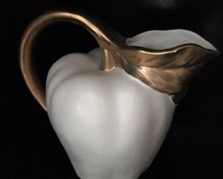 white and gold pitcher