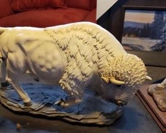 Carved buffalo statue