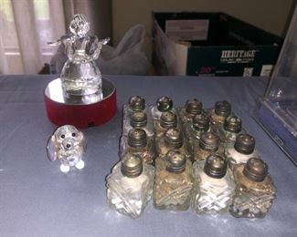 Salt and pepper shakers with sterling silver tops