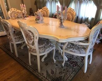Matching dining room table with (8) chairs total.....