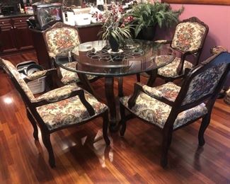 Glass topped table with 4 chairs.....