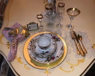 JB china set, gold flatware and gold trimmed crystal glasses
