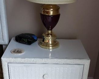 white wicker bedside table