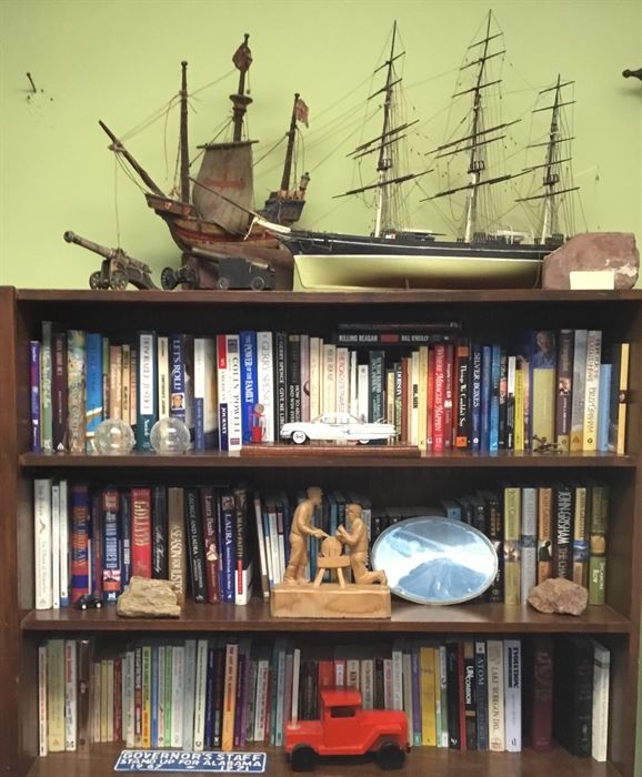 Military books, novels, cannon bookends.