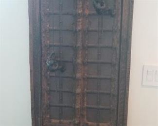 One of a kind wood and metal.sculpture from India men climbing