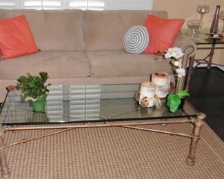 Leggett and Platt double sofa bed. Glass top coffee table on metal base...matching end table