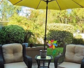 Swivel patio chairs, side table, umbrella