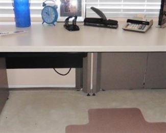 Desk: 8-feet  long laminate top on steel base. Steelcase? Great workspace.