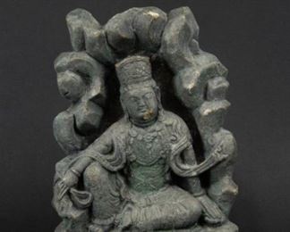 A Carved Stone Figure of Seated Guanyin