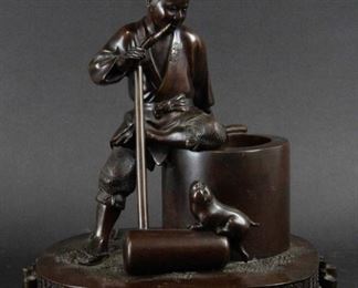 A Meiji Bronze Mochitsuki Figure