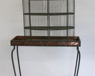 Antique Iron Planter Together With A Bird Cage