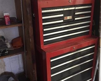 Very full garage with nice tool chest and tool file drawers