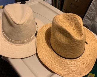 Several men's and women's hats.