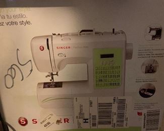 Singer sewing machine in box