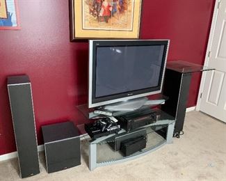 Flat panel TV, stand, speakers and battery back up