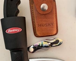 Several assorted pocket knives