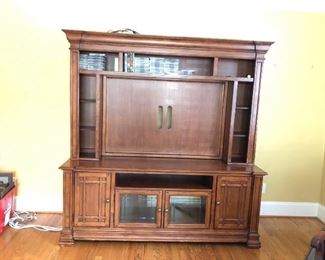 Nice TV Cabinet  with storage fits up to a 60 inch TV  .  Solid wood two piece by hickory white furniture company . 76”long 21”deep 78” tall asking $250 cash  and you pick up  . (Can be sold early) contact Eva  704-605-6368