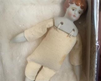 Miniature china doll