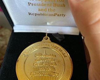 Republican gold medal awarded by President Bush