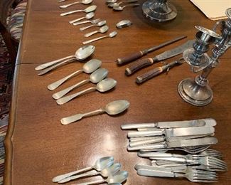 Assorted vintage spoons and silverware
