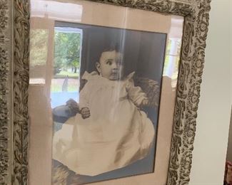16x20 photo of baby in elaborate frame