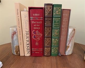 Leather, nice bookends. Several pairs of bookends....