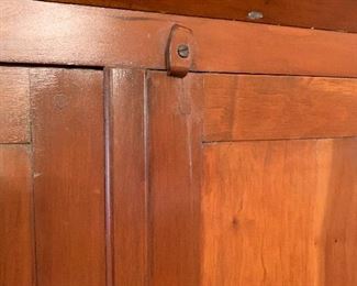 Closure on 19th century corner cupboard