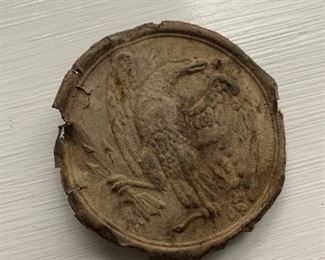 Lead filled Civil War buckle, circular eagle breastplate, worn on cartridge box, partial loop intact. Dug on site.